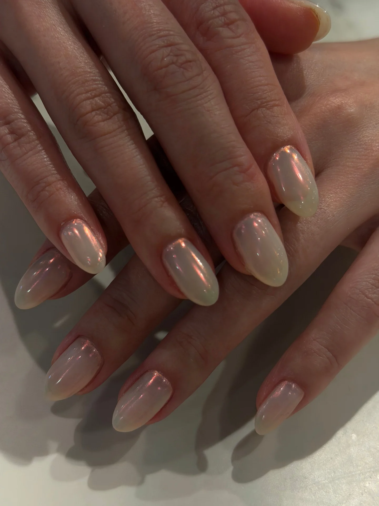 Pearly mirror manicure by Bella Beauty