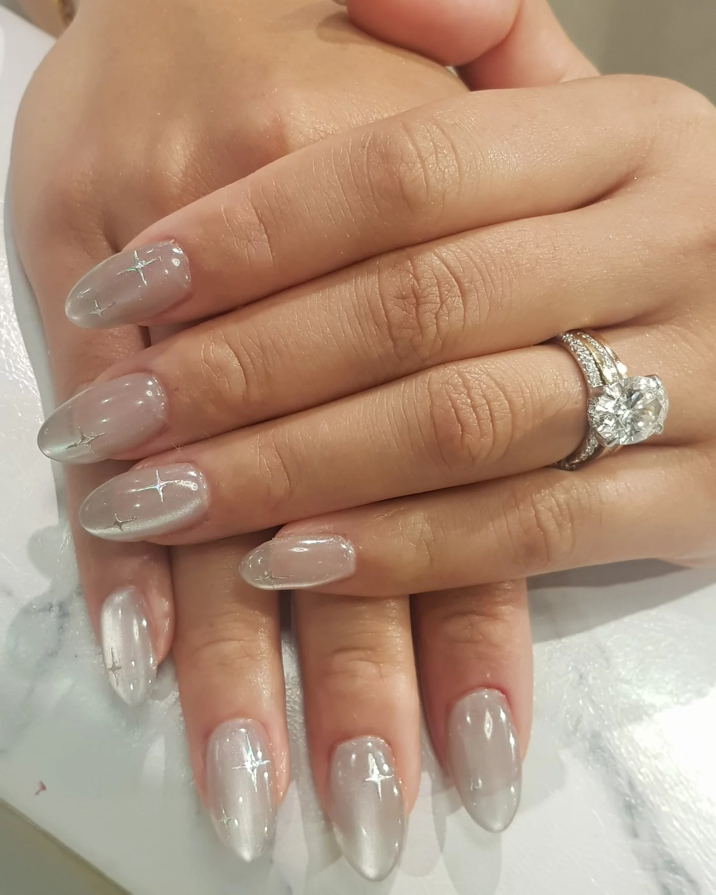 Pearl and silver translucent manicure by Bella Beauty